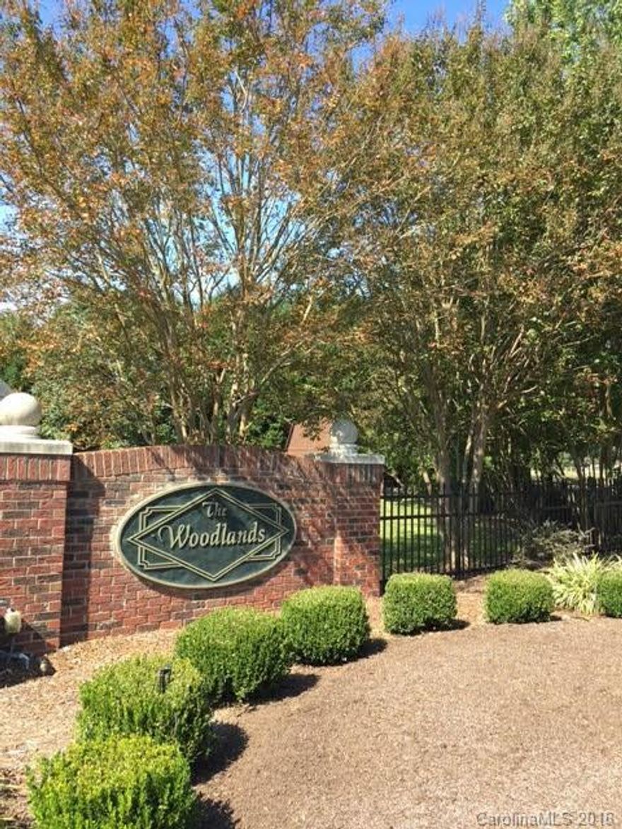 Cleared, buildable lot in desirable community of The Woodlands.  Community is nearly completely built out with very few lots left.  Community Restrictions require full brick home.  CCR's available upon request. Minimum Square Footage for one story home-1350; on and a half story home - 1400.  Community is connected to the Carolina Thread Trail with an entrance point just down the street. Half mile paved trail (ADA Compliant) winds through the trees and leads to Bellingham Park.