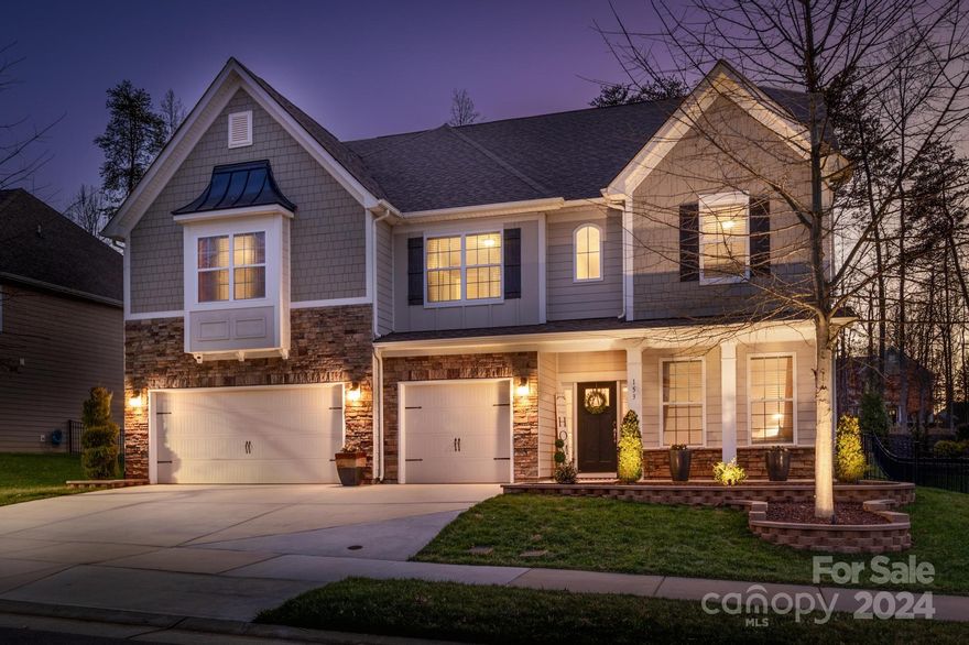 Elevate your lifestyle and own a gorgeous home in Mooresville's Lakewalk waterfront community. The 2nd floor primary suite will be your haven, where you can enjoy the sitting area, the expansive walk-in closet, and great primary bath. Plenty of room to gather around the kitchen island for heartwarming meals and parties. Or move the party to the outdoor kitchen, where you can cook on the 48" Profire gas grill. Cozy up to the great room fireplace, or enjoy the screened-in porch and patio, firepit, and fenced-in back yard. Upgraded landscaping and lighting invites you into the 2-story foyer, and elegant office/study with French doors. Neighborhood includes amenities such as swimming pool, walking trails, pickleball, playground, and Lake Norman access! Conveniently located, only 2 miles to the new Iredell medical center; and nearby shopping/dining. A short drive to the Charlotte-Douglas Airport and all that Charlotte has to offer. Schedule your showing today!
