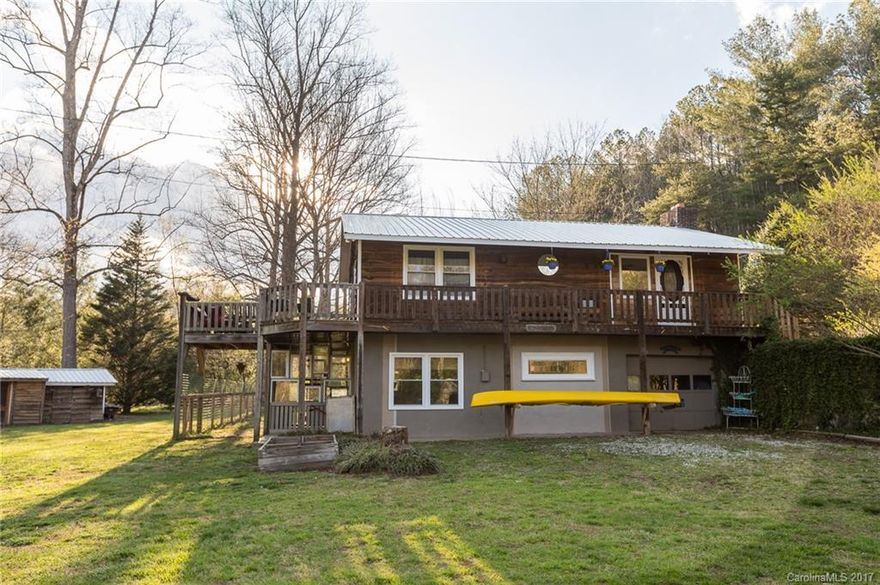 3/2 spacious open floor plan in peaceful country setting w creek.  Start small hobby farm or homestead. 9+ acres of beautiful mountain property w/ starter road to upper mtn views. Large fenced area for dog, chickens, goats, etc. 2+ acres of level land w/ creek & gardens. Lower level master suite w/ many craftsman touches; 3 locally hand thrown pottery sinks, large tiled shower, french doors to outside sunroom, sliding barn door. Fire pit area, horseshoe pit, tree house! New metal roof 2017.
