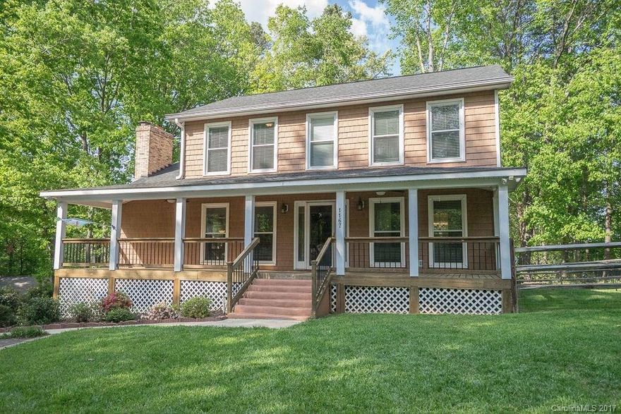 Enjoy Breakfast on the Back Deck of this Beautiful Three Story WATERVIEW home.  Finished Basement & Flat Fenced Yard.  Master Bedroom & Two Bedrooms Upstairs.  Bonus Room & Bedroom w/Full Bath in Basement. Working Gas Fireplace in Living Room.  Office has Built-In Bookshelves.  Your Boat can be Parked under the Back Deck Storage Area.  Enjoy the Tega Cay Good Life - pool, tennis, clubhouse, golf & more.
