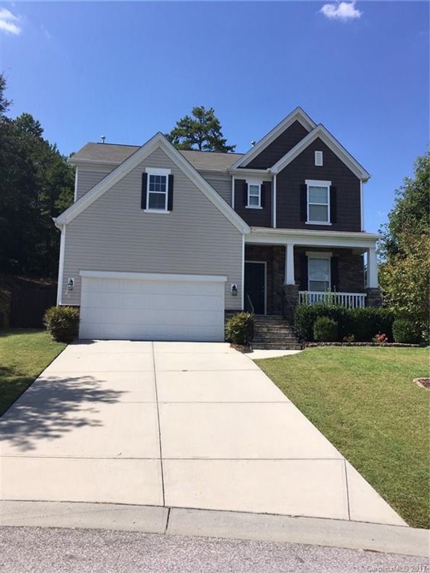 If you like being in the quiet part of the neighborhood, this house is for you! Located on a cul-de-sac, this home's backyard is peacefully nestled into the woods that surround it on two sides. Children can play in the low traffic cul-de-sac as adults lounge on the spacious front porch. New air conditioning unit in 2016! Hardwood floors just refinished! Neutral paint colors and open floor plan. Master suite has vaulted ceiling. Immaculate house zoned for award winning Fort Mill Schools!