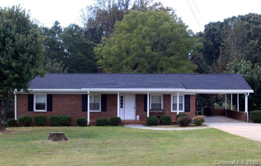 ***REDUCED AGAIN*** BRING OFFER***OWNER READY TO SELL *** This 3 bedroom 2 bath home brick home had new architect shingles installed in 2012 along with a new Trane propane furnace. It has new replacement windows and gutters. Two brick fireplaces. One fireplace is situated upstairs in the den area and the other fireplace downstairs in the full basement. Both have new gas logs. Electrolux central vacuum throughout this home makes it easy to maintain. This home has oak sub-flooring that was installed in the time period when quality built homes was the owners main concern. The home is perfectly located in the city limits but far enough out that it possesses that county feel. Finding a home with all the updates, cleanliness and location at this price are hard to come by. A must see.