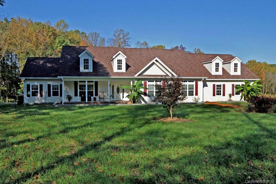 Welcome to this estate consisting of a 2010 Custom Modular that rivals and any stick built house you could put up. $30k kitchen, granite, walk-in tub, wet bar, hardwoods, split br plan, 4-car garage and 1700sf roughly of attic space. Built w 2x6's, screws, airtight! Low utility bills. This is the main home after you pass the gates. 2nd property is a 1000sf doublewide. 3rd home is a poured concrete basement for a proposed home! 8500sf hay barn, 3500sf shop, 12-stall barn & 2 acre pond!