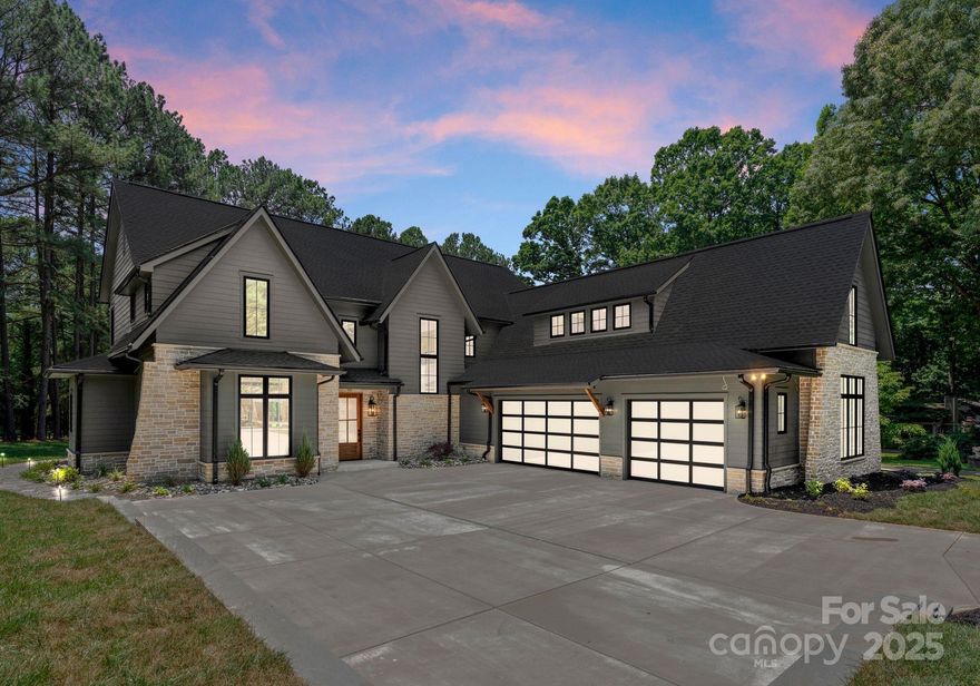 Experience the best of Lake Norman living in this stunning new construction on a generous .68-acre corner lot in the charming Rockridge Shores community. This modern Tudor-style home offers over 4200 SF of thoughtfully designed living space. The open-concept floorplan features a soaring great room & a chef’s kitchen w/ top-tier appliance package, oversized island & walk-in scullery. The main-level primary suite is a serene retreat w/ spa-like finishes, while the upper level offers 3 spacious bedrooms & a versatile bonus room or 5th bedroom. Outside is your private backyard oasis w/ heated saltwater pool & spa, covered porch & gas fireplace. A standout feature is the expansive concrete courtyard driveway, designed for ample parking & to fit a full-size pickleball court—bringing resort-style recreation to your doorstep. Additional highlights include community Lake Norman access w/ private boat ramp. This is where modern luxury meets lakeside vibes—welcome to the best of both worlds.