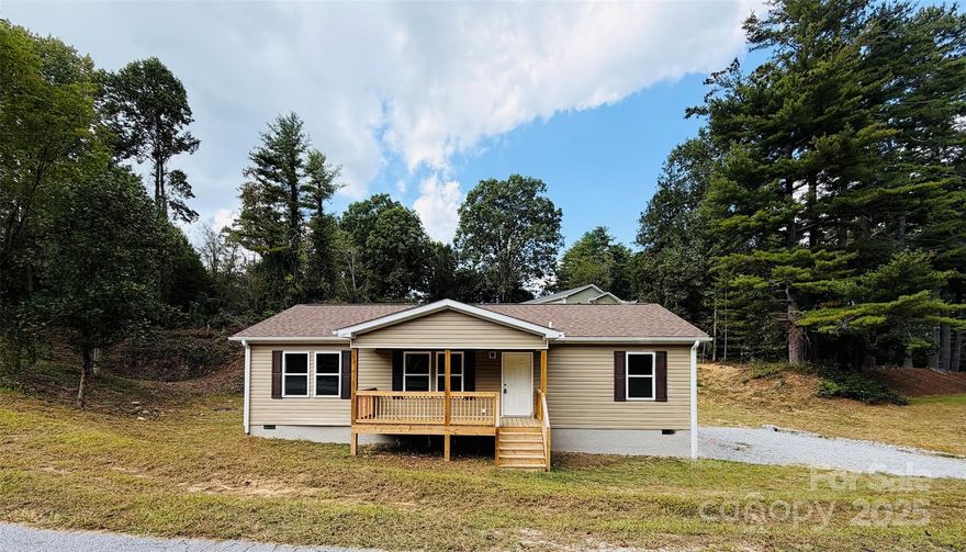 Discover the charm of Lenoi’s Mountain Lake Homes at Osceola Lake, where brand-new construction meets the natural beauty of the Blue Ridge Mountains. Located just a few miles from Historic Downtown Hendersonville, this home offers the convenience of city living without the burden of city taxes.
This newly completed 3-bedroom, 2-bath home showcases quality craftsmanship and comes with the assurance of a builder’s warranty. The open floor plan is bright and inviting, designed for both comfortable everyday living and entertaining. A new refrigerator and stove will be provided once under contract, ensuring a move-in ready experience.
As a resident of this picturesque mountain lake community, you’ll enjoy access to beautiful Osceola Lake, perfect for quiet mornings, weekend fishing, or simply relaxing in a peaceful setting.
Whether you’re searching for a full-time residence or a mountain retreat, 204 Oscelake Way offers the perfect combination of modern comfort and timeless mountain charm.