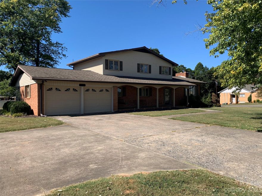 Great opportunity and potential with this three bedroom, two and a half bathroom home. Eat in kitchen and dining room. Home feels very spacious with good sized bedrooms and an office area. There's a wood burning fireplace in the family room that's never even been used. Basement has an additional garage door for easy access and storage. Nice 20x20 shop/garage. It also features a beautiful & large backyard that's fenced!  Ready for a new family and updates!