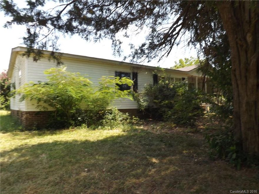 5 aces of Weddington Land !!!! This is a beautiful building site. Currently a mobile home is located on the nice hill that overlooks you acreage.  Home has no value, Many fruit trees and mature trees are located on the land.
Great spot for horses, pond or perfect for your grand estate. Buy 5 acres for a 1 acre price!!! Well and septic on the property.