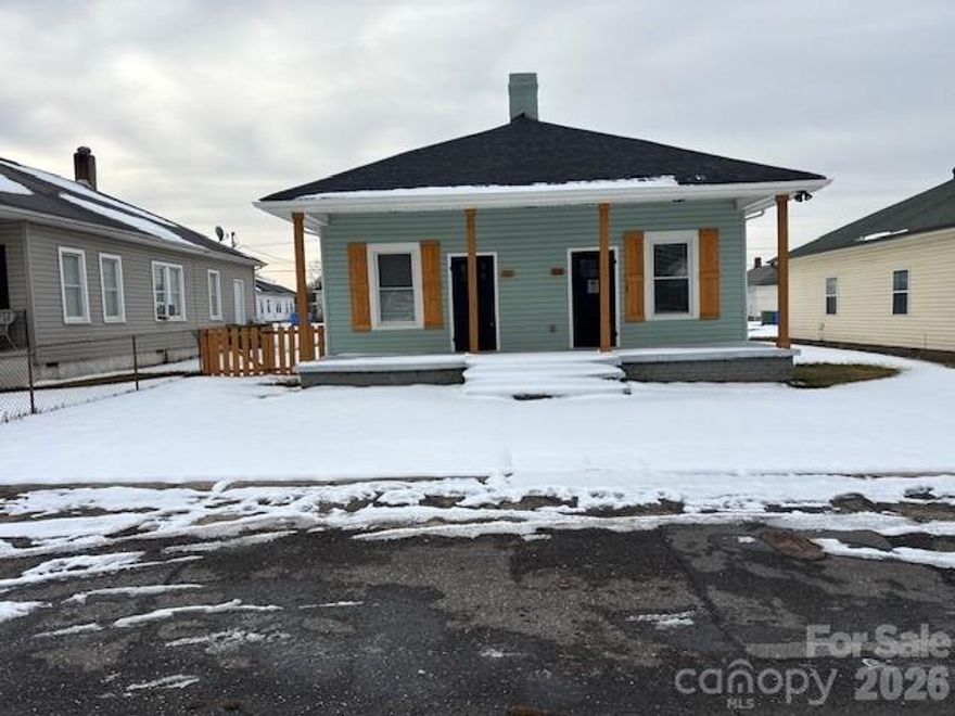 Charming duplex offering two 1-bedroom, 1-bath units with efficient layouts and comfortable living areas. Each unit provides privacy and functionality, making it perfect for tenants or an owner-occupant seeking supplemental income. Centrally located with easy access to local amenities, this property blends convenience with opportunity. Owner/Broker. Previously rented for $1,250 per side. The kitchens and Bathrooms are large. The floorplans are opposite for maximum privacy. 53-54 Rex Avenue is quiet and located in the heart of Ranlo. There is a park nearby and the Town has events several times a year. The current mayor's mom lives on the same block as this duplex. Seller is offering a home warranty.