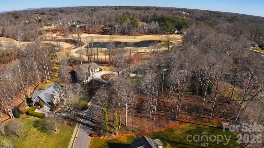 This fantastic half-acre lot offers an exceptional opportunity to build your dream home in the highly sought-after Rock Barn Country Club and Spa community. Nestled on a peaceful, quiet street, this property provides the perfect blend of privacy and convenience. With no city taxes, you'll enjoy the benefits of serene living while still being just minutes away from major routes. Located near I-40 and Hwy 16, this prime spot offers easy access to Hickory (15 minutes or less) and Charlotte (50 minutes). Rock Barn is renowned for its world-class spa, championship golf courses and exceptional dining services open to the public. Optional club membership gives access to the Robert Trent Jones Golf Course, Fitness Center, Main Dining in Club House, Pool and Court Sports. Seize this opportunity to make this lot the site of your future dream home and a lifestyle of comfort and leisure.