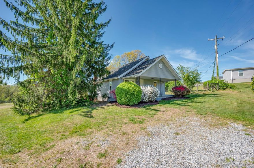 This house has lots updates and is ready to move in and in a great location.  3 bedrooms, 1 bath with hardwood floors and vinyl plank flooring. The property is surrounded with beautiful year round views and mountains, with plenty of green space with over an acre of land and a fenced area. Perfect for downsizing or starting out, check out this lovely spot today!