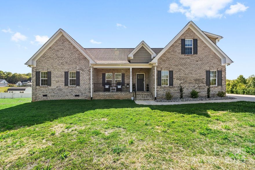 This Charming residence boasts four spacious bedrooms and two full bathrooms, making it the perfect sanctuary for families or those seeking extra space. As you step inside, you'll be greeted by beautiful hardwood floors that flow seamlessly through the main living areas, creating a warm and inviting atmosphere. The open concept layout allows for effortless entertaining and everyday living. The kitchen features modern appliances and ample counter space, ideal for culinary enthusiasts. Each bedroom is generously sized, with carpeting for added comfort and coziness. The bathrooms showcase elegant tile work with tons of space. Outside the brick exterior offers timeless appeal, while the backyard presents a serene space for outdoor gatherings or quiet moments of relaxation in the hot tub. Don't miss this opportunity to make this beautiful home your own!