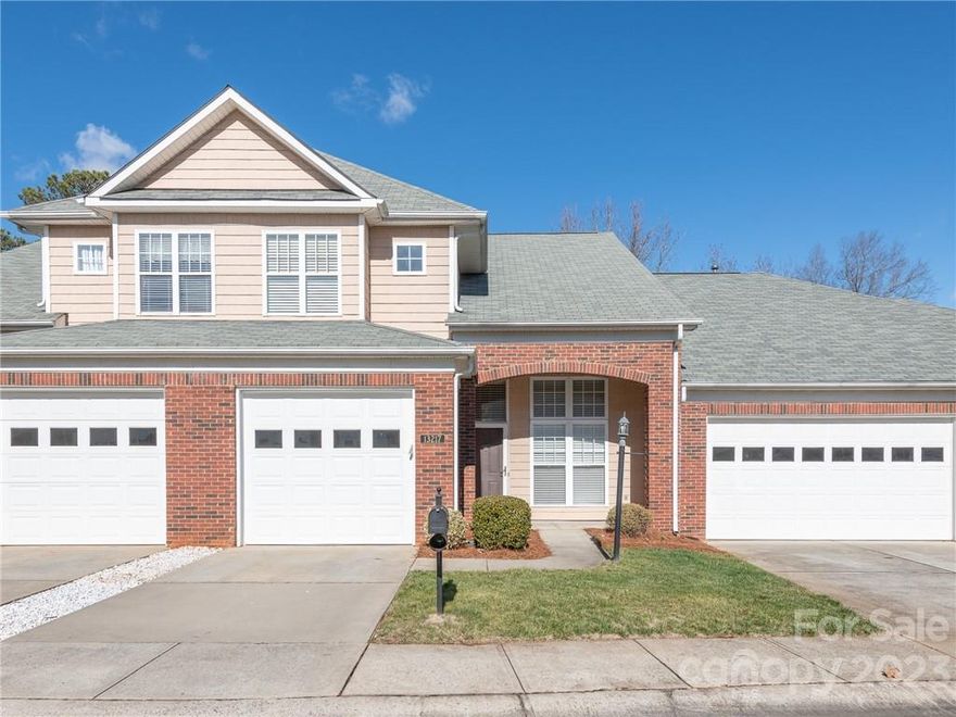 Beautifully bright and open townhome with peaceful pond view from patio in Mint Lake Village. Welcome in to a grand open floor plan living space including two story living room with gas fireplace and doors leading to patio space out back. Wooden plank flooring throughout. Kitchen with dark cabinets, tasteful backsplash, SS appliances and granite counters with open breakfast bar perfect for entertaining. Primary bedroom located on main level with large ensuite. Dual sinks, soaking tub, stand-up shower and large walk-in closet provide a relaxing space to get ready for the day. An open upstairs loft is perfect for game space / home office. 2 carpeted bedrooms both with TONS of space and attached full baths. Perfect for families and guests! Very peaceful and friendly community just 10 minutes from the local shops and restaurants in downtown Matthews. HOA includes water fee & ALL landscaping/exterior maintenance. Won't last long!