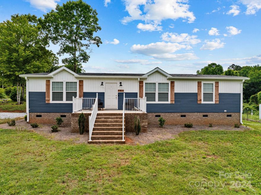 Love country living? Come check out this 2022 mobile home sitting on 2 acres. One acre is fenced and has hay storage for your horse or maybe a mini cow! The home sits at the back of the property and offers the most amazing views of rolling farm land. Home was built as a 3 bedroom (has closet) 2 bath, but has a 2 bedroom septic. Seller has spoken with Enviromental Health and it may be possible to change the septic to a 3 bedroom with the addition of more drain field. Room is currently being used as extra sitting/den area. Includes a full appliance package and ready to move in!