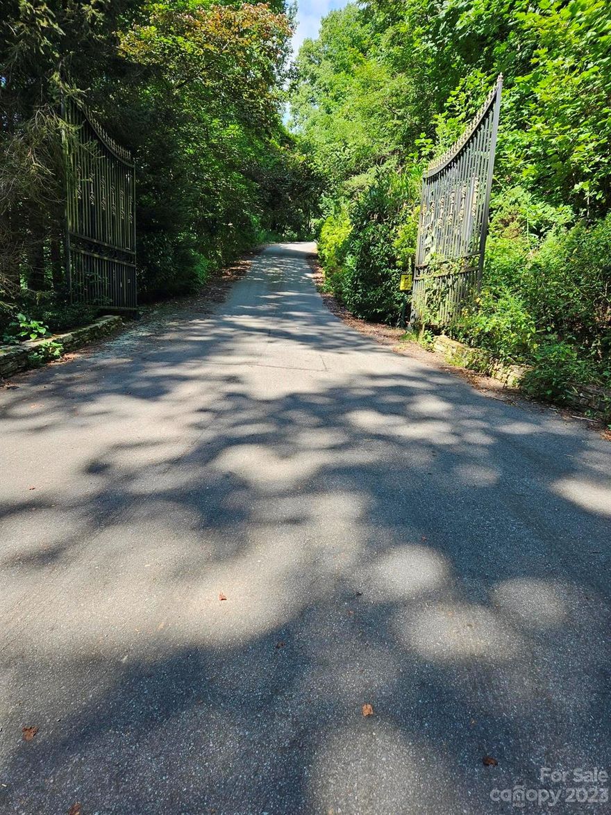 Located in gated Community. Mountain Views, Year round access via paved roads. Located above the Maggie Valley Country Club.