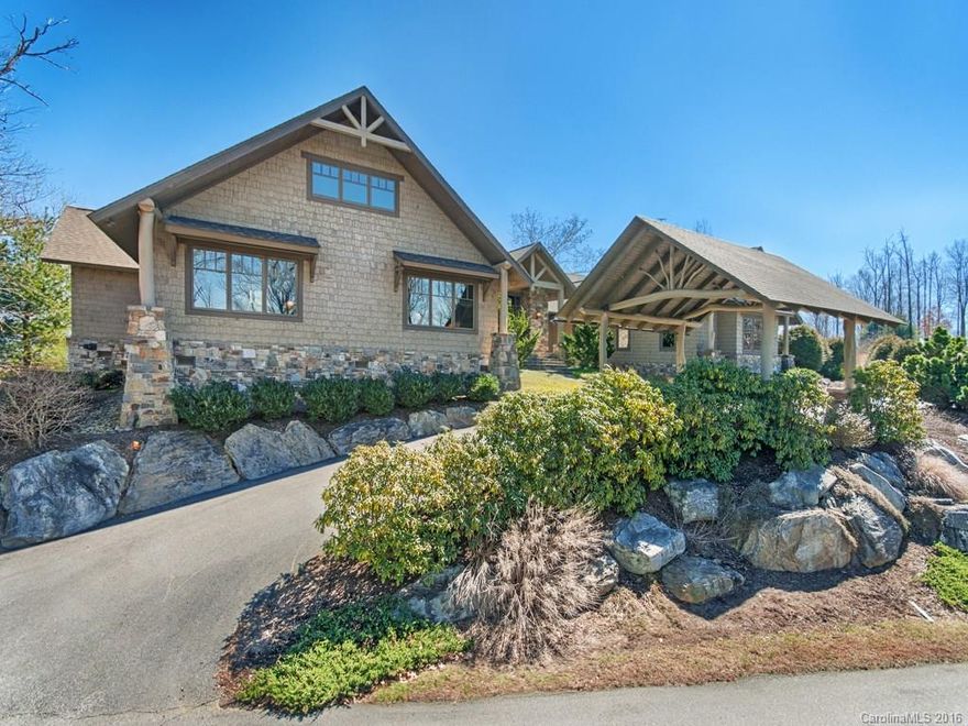 SWEEPING, STUNNING, VIEWS abound from this ONE LEVEL masterpiece.Timeless,stone and timber 

frame lodge set on level lot with exterior beauty relying on natural materials of Virginia fieldstone,hand 

peeled locust logs,and cedar shakes. Lodge room (29 x 40) evokes Grove Park Inn feel with natural 

stone fireplace,vaulted beam ceilings,oak floors,and massive viewing windows.All living areas including 4 

BR's and office on one level.Upstairs ready to finish(1180SF).Furnishings stay.