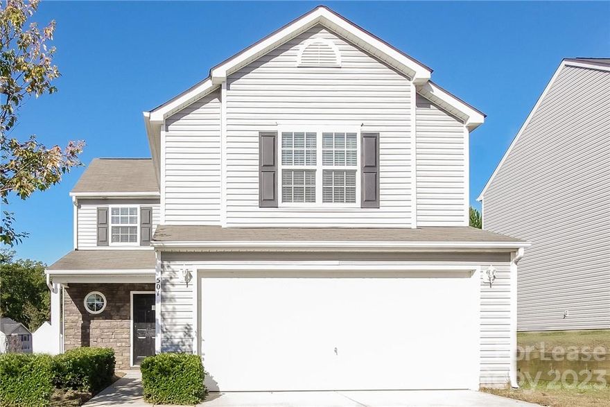 Beautiful stone accented home in a quiet neighborhood in Charlotte. The open floor plan boasts laminate flooring, a great room with fireplace, formal dining room and an eat-in kitchen with pantry for extra storage. The second level master suite features a vaulted ceiling, separate shower and garden tub. Enjoy your neighborhood by going to the community park and playground.