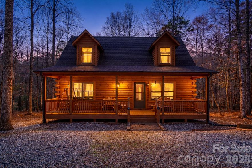 Impeccably maintained, move-in ready log cabin with hot tub, privacy, and short-term rental potential in the sought-after gated community of Hearthstone Ridge.

Step into this exceptionally cared-for retreat nestled on 1.81 acres of wooded tranquility, where indoor comfort blends seamlessly with outdoor living. Enjoy your morning coffee from the covered front porch as sunlight filters through the trees, or unwind on the upper-level deck in your private hot tub after a day in the mountains.

The main level features a cozy living room with fireplace, a spacious kitchen with ample dining space and breakfast bar, plus two bedrooms and a full bath.  Upstairs, the primary suite offers an ensuite bath and loft space ideal for a home office, reading nook, or additional guest accommodations. 

Located just minutes from Rutherfordton's charming Main Street with local dining, breweries, and shops, and within easy reach of Asheville and surrounding mountain destinations, this property offers the perfect balance of seclusion and convenience.

Thoughtfully furnished and styled, with select furnishings available for purchase outside of contract - offering a potential turnkey setup for buyers seeking a seamless transition.

Whether you're searching for a full-time residence, weekend escape, or investment opportunity, this cabin delivers comfort, versatility, and timeless mountain appeal.