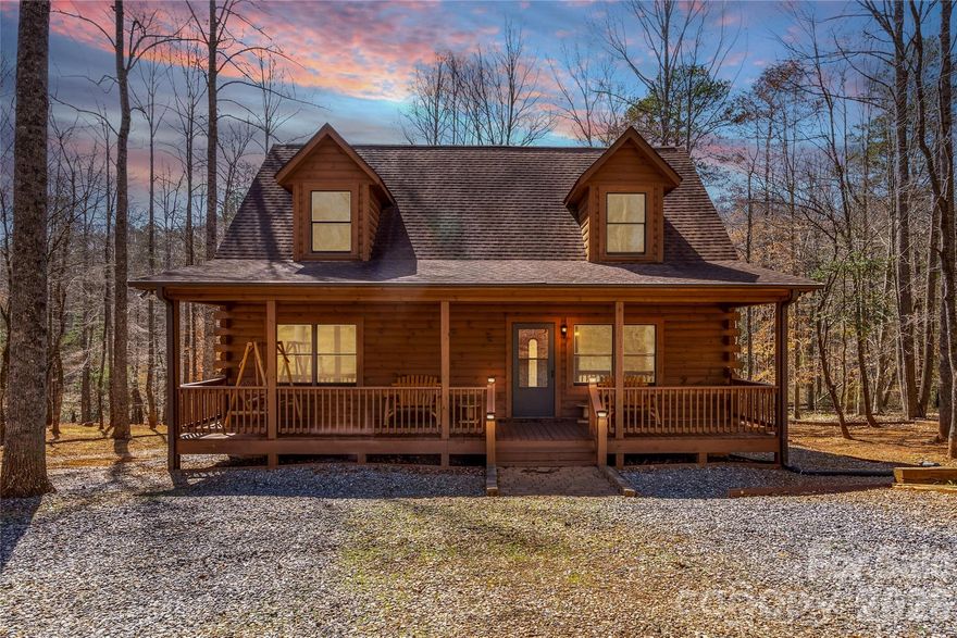 PRISTINE 3BR LOG RETREAT | 1.81 ACRES | GATED PRIVACY
Rare "like-new" condition in the sought-after Hearthstone Ridge community. Unlike many mountain properties, this custom cabin has been exclusively used as a private getaway by the original owner and has never been a rental. The pride of ownership is evident in every corner. At 1,648 sq. ft., this home offers significantly more space and versatility than the standard 2-bedroom cabins in the area.

INTERIOR HIGHLIGHTS: The vaulted main level features a cozy living room with a fireplace and a spacious kitchen with a breakfast bar. Two bedrooms and a full bath complete the main floor. The entire upper level is a private primary sanctuary, featuring an ensuite bath and a versatile loft perfect for a home office or guest overflow.

OUTDOOR LIVING: Tucked at the end of a quiet cul-de-sac, enjoy total seclusion on nearly 2 wooded acres. Relax on the covered front porch or unwind in the private hot tub on the upper sun deck.

LOCATION & POTENTIAL: Minutes from Rutherfordton’s Main Street dining and breweries, yet easy access to Lake Lure and Asheville. High-quality furnishings are negotiable for buyers seeking a turnkey mountain transition. Whether you are looking for a full-time residence, a second home or a short-term rental property, this is the highest quality-per-square-foot log cabin value in the subdivision and surrounding areas.