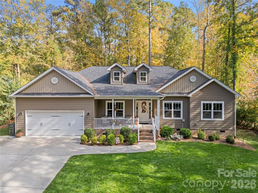 Welcome home to this awesome 3 bedroom ranch on over an acre of land with no HOA in the heart of Lake Wylie! Open floor plan features a Kitchen with large island, abundant storage and work space. Huge great room. Primary bedroom offers dual vanities and large shower. Two more bedrooms share full bath. Office/flex,  powder, and laundry rooms. Great back deck perfect for relaxing and entertaining. Huge wooded yard for peaceful afternoons. Rocking chair front porch. Still under builder warranty! The town of Lake Wylie features award winning schools, convenient shopping and dining, close proximity to Charlotte, Fort Mill, Belmont and the airport. Just minutes to the public landing on beautiful Lake Wylie for boating access, lakefront dining, and water recreation. This is the one you have been searching for! *Owner is a licensed agent