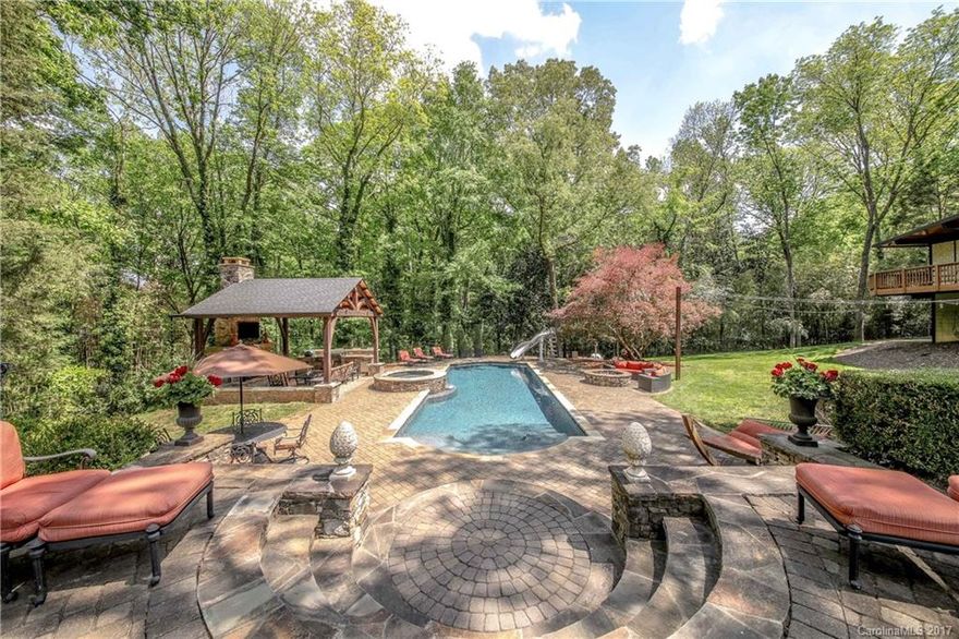 SPECTACULAR SOUTH PARK ESTATE!! Beautifully designed & built w/attention to detail & quality. The grand entry is accompanied by the elegant & spacious Dining Room & Living Room. Main level Master Bedroom w/elegant bath & main level guest rm or office. Incredible bar, Gourmet kitchen w/new marble counter tops, new back splash, new lighting & MORE! Wood floors throughout most of home. INCREDIBLE grounds w/pool & outdoor living space w/FP. GUEST HOUSE! w/private drive, Kitchen, LR, Bedroom & Bath!