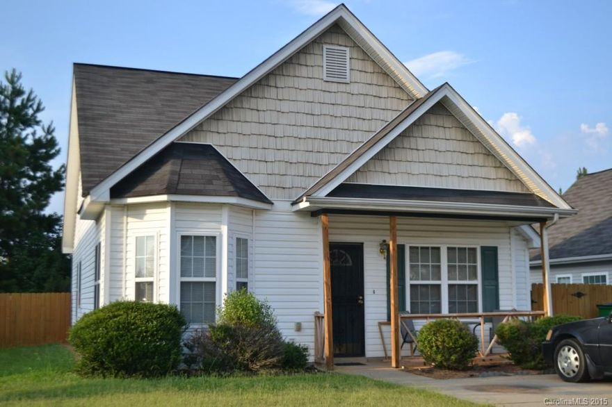 Cozy 3 bedroom home with vaulted living area, arched entryways and gas fireplace.  Flat open yard in back with privacy fence.  New ceramic tile.  Easy access to major highways, UNCC, shopping and hospitals.