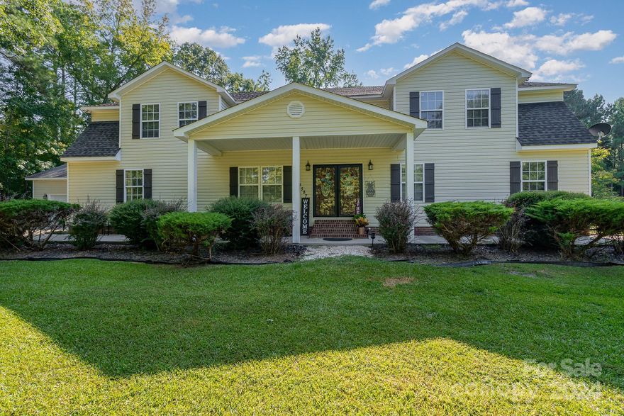 Welcome to your dream home in Heath Springs, SC, where luxury meets functionality. This one-of-a-kind estate boasts a jaw-dropping 6 bedrooms and 5 baths sprawled over 6,000 sq. ft. Sitting pretty on 3 private acres, this home is your family's personal retreat. Got a big family? Or maybe you’re planning on one? This place is perfect for multi-generational living—whether it's kids, grandparents, or the occasional guest who just won't leave. Everyone gets their own space. Two primary bedrooms, one up and one down. Now, let’s talk about that drive-thru garage. Yes, you read that right. Roll in, roll out—convenience just got a whole new definition. Perfect for those of you with a car collection or just a lot of stuff (we don’t judge).Tucked away in the serene setting of Heath Springs, this property gives you all the privacy you’ve been dreaming of, with just the right amount of peace and quiet. You won't find another home like this in town—or anywhere, really.