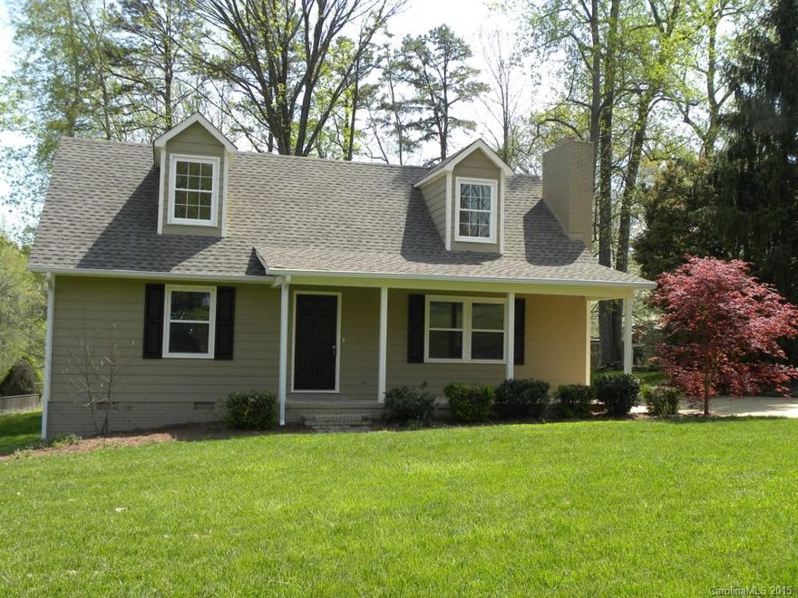 MOVE IN READY UPDATED 2 story cape cod home with a front porch.  New granite and appliances in the kitchen, updated bathrooms, paint and carpet, windows and newly painted on the outside.  Two bedrooms down with a full bath and two bedrooms up with a full bath. Great deck for outside entertaining overlooking a large backyard.