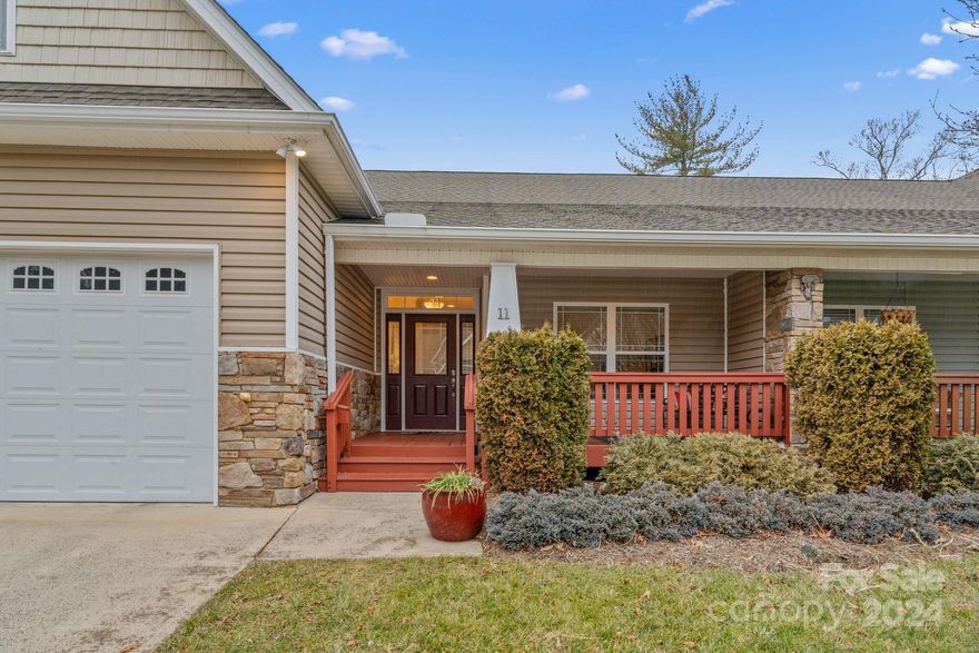 Just the home you've been waiting for. Sounds of a stream from your screened balcony! Welcome to Mayfair Glen (a hidden gem just 6 minutes to downtown Asheville). This spacious home offers one level living with primary and 2nd bedroom, 2 covered porches, kitchen, dining, living, laundry & garage on main level! Upper level features one bedroom, bath, & sitting area for office/studio. Lower level has a 2nd primary bedroom, bath, kitchen, entertainment & dining area with access to patio and creek for quests or multigenerational living. Home features new quartz countertops, sun tunnels, 9' ceilings, livable floor plan, storage, and 3 covered porches. The sound of the stream is a surprise for the soul. Located in East Asheville with access to everything that makes this a great place to live, work, and play. HOA is responsible for most exterior maintenance and lawn care. Best townhome value on the market. See video tour for walk-through of property. We look forward to your visit.