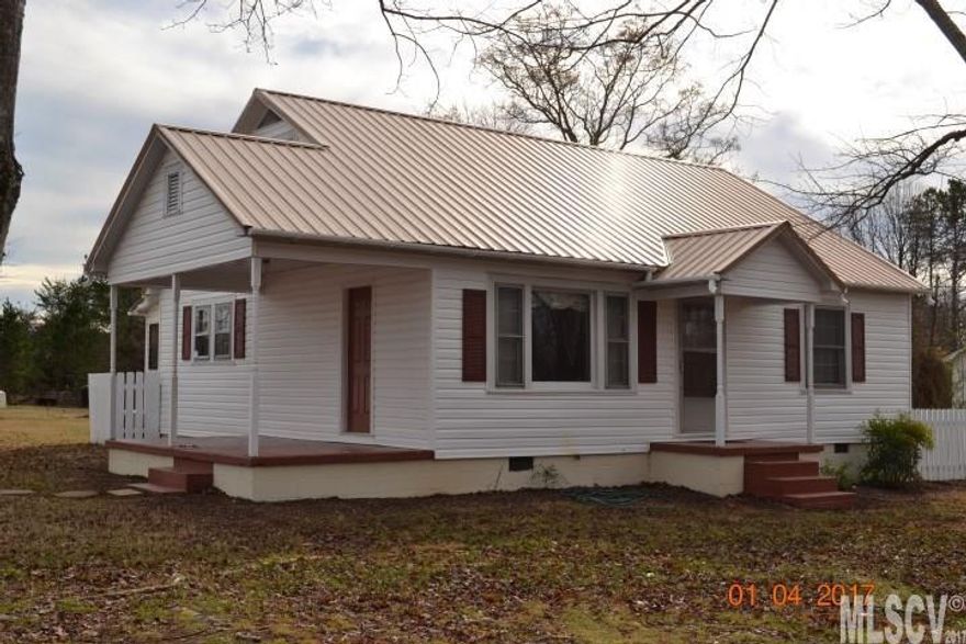 All stats per seller to be verified by buyer/buyer's agent! Come and see inside! Updated flooring, paint, total remodel of bath, enclosed rear porch and new laundry room with washer/dryer to stay, finished bonus room and a second full bath upstairs, new ductless heat pump upstairs, new vinyl siding, new metal roof in the last 5 years, range and refrigerator stay, free standing propane fireplace on main level in center hallway, heats whole house per seller, detached 12.8x20 building, metal storage building, fenced are in rear with chicken coop and rabbit pen, must see inside. *No permits pulled for updates