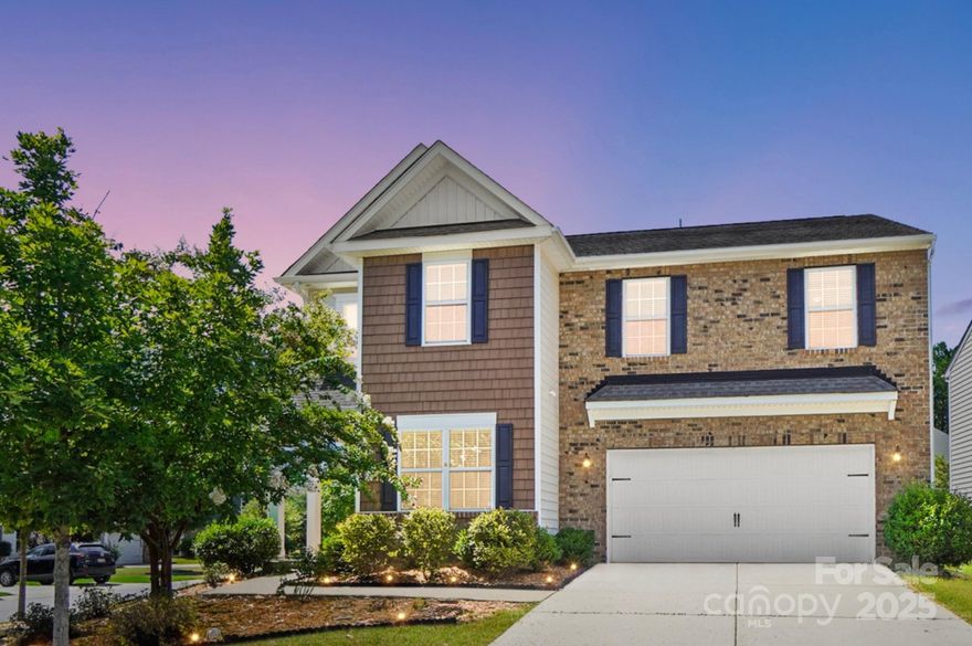 Beautifully positioned on a corner lot, this home blends style and comfort in a warm, amenity-rich community. Inside, gleaming hardwood floors, granite countertops, and a flexible bonus room await—ideal for a home office, play area, or creative space. The open loft adds another cozy nook for relaxation or fun. Retreat to the generous primary suite, featuring a luxurious garden tub, separate shower, and spacious layout. Outside, enjoy easy access to neighborhood perks including a clubhouse, swimming pool, and playground—perfect for daily living and entertaining with neighbors. Located just a short drive to the Ballantyne area, Fort Mill, and uptown Charlotte, this home offers the best of both serene suburban life and easy city access.