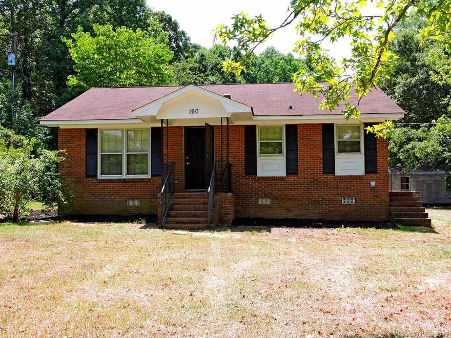 Very nice 2BR/1BA home on a 1 acre lot in a quiet county neighborhood. Full brick veneer w/concrete ramp to side door. Spacious living room, nice eat-in kitchen w/pressed metal backsplash & stainless appliances, & separate laundry room. Freshly painted & nicely updated. Ready for immediate occupancy & eligible for 100% USDA financing. Storage building included. Lot extends into woods at back.