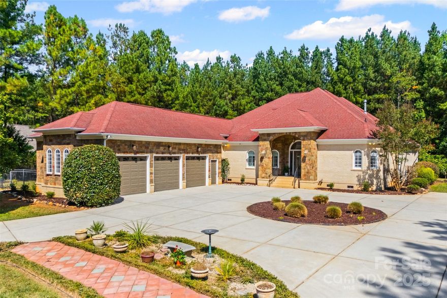 Exclusive Catawba Shores Estates. Set on a private 1.24-acre homesite, this refined 4BR | 2 Full + 2 Half Bath residence welcomes you through a stunning entry into an open floor plan that frames the dining room and transitions to a gracious living room with a gas fireplace flanked by custom bookshelves. A chef’s kitchen appointed with Wolf appliances anchors the main level and connects seamlessly to the showstopping 627 sq. ft. covered patio—the home’s centerpiece for effortless indoor–outdoor entertaining or a quiet morning coffee. The primary suite pampers with heated bath floors. A large main-level flex room provides true versatility—5th bedroom, private office, or playroom. Thoughtful upgrades abound: new light fixtures, oversized pantry, huge laundry room, two HVAC systems (zoned), Generac natural-gas backup generator, water softener, central vacuum, and fresh interior paint. Outside features include an oversized three-car garage, expansive driveway (the costly concrete is already done), and a work shed with electric. Community amenities elevate everyday living with a pool and 120+ acres of green space and trails—an upscale lifestyle with upgrades too numerous to list.