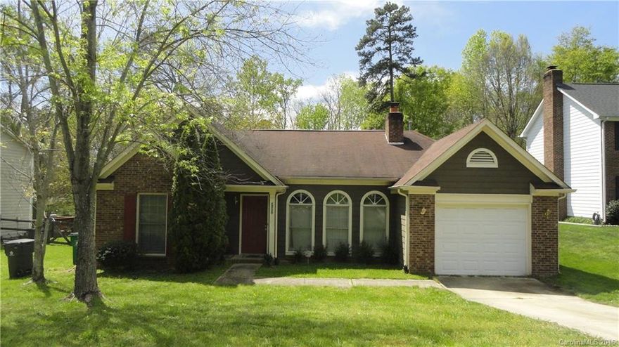 Huge fenced back yard with deck. Large master with master bath and fireplace in great room.