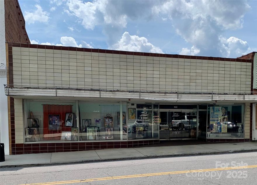 Prime All-Brick Commercial Building in Downtown Chester. Don’t miss this unique opportunity to own a high-visibility commercial property in the heart of downtown Chester. This all-brick building features large showcase windows, perfect for retail displays and attracting foot traffic. Inside, you'll find a welcoming reception area right at the front entrance, generous office space with plenty of storage, and room for a conference area or creative workspace. The property has a rich history — currently home to Z1 Model and Talent for 38 years.  Prior to agency, it was also known as "The Hub", a popular men’s fashion and clothing store. The layout is ideal for a boutique, clothing store, retail shop, or office. The fully functional lower level includes a rare bonus feature — a built-in fallout shelter — along with an additional bathroom. Upstairs, there are four bathrooms to accommodate staff or clients.
With its versatile space and location in a growing downtown area, this property offers endless potential. Make this spacious commercial space yours and be part of Chester’s exciting revitalization!