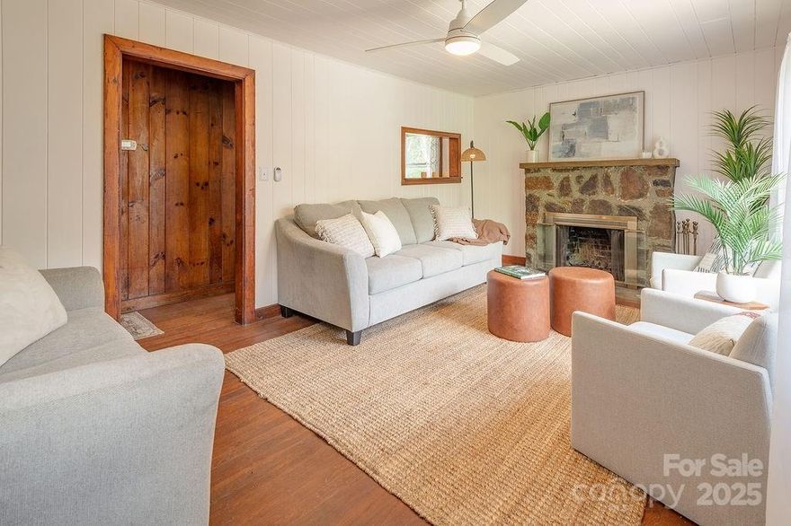 New look & new price! If you're a music fan, now's your perfect chance to own a piece of Asheville music history! This Annandale charmer was once the childhood home of legendary musician Warren Haynes, of the Allman Brothers Band, Gov't Mule and the host of Asheville's Christmas Jam! This cozy 3-bedroom, 1-bath home features a spacious, fenced backyard perfect for outdoor living, gardening, or relaxing. Hardwood floors, great light, wood burning fireplace, a cute galley kitchen, and tongue and groove ceiling add to its charm. A single-car basement garage offers extra storage or a small workshop. The house needs some TLC but is full of potential to become the quintessential AVL home. Located in a prime area, this is a fantastic opportunity to invest in a solid property with great bones. Don’t miss your chance to create something special in a home with rich history in one of Asheville’s most sought-after neighborhoods!