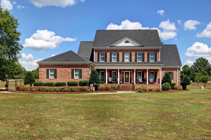 This beautiful full brick home on almost 3 acres is the one you have been looking for! Large welcoming covered front porch, 2 car oversized garage. HUGE deck & gazebo are perfect for entertaining! Large island kitchen offers an eat-up-bar & breakfast area, lots of pantry & cabinet space. The 2 story great room is welcoming & inviting with the gas fireplace and built-in's. Off of the foyer there is a formal living room/sitting/office area and a beautiful dining room! Master on main.