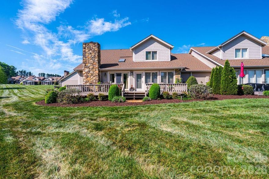 Well-loved and maintained!  This end unit townhome overlooks the 11th fairway of the Championship Jackson Course at Rock Barn Country Club and Spa in Conover, NC.  Have a front row seat to one of Golf Digest's annual "Best Place to Play" award recipients.  The back deck is a great place to gather and enjoy the outdoors.  Once inside you'll appreciate the large windows, the sky lights and the openness of the living area!  Very inviting, with a natural flow.   Enjoy easy living with the primary bedroom, living, dining, laundry, sunroom, kitchen, garage - all on the main level!  Upstairs you'll find two guest bedrooms, a full bath, nice closet spaces, and a fun sitting area with bookshelves that overlook the great room!  Rock Barn Country Club and Spa is a destination spot.  Known for its two championship golf courses, you can also enjoy tennis, pickleball, dining and the award-winning spa.  Golf cart friendly neighborhood!    Beautifully landscaped entrance! A true pleasure to come home to! Come take a look!