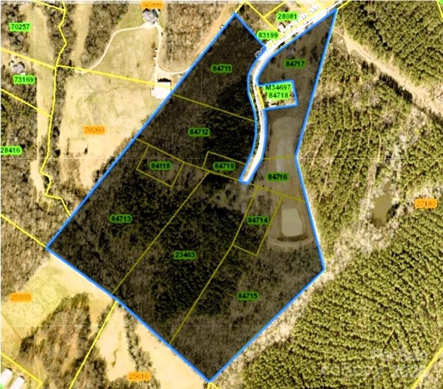 10 separate parcels that equal an impressive 52 acres located in Iron Station, NC. Southmont Rd is a private, dead end street and this 52 acres is located on both sides on the back half of the road. There is over 2,000 foot of road frontage. 3 creeks cross the property. There is a vacant double wide on the property. Previously held additional homes and has a total of 4 wells and 4 septic tanks already existing. Seller has spent over $150,000 constructing a pond that expands 4 acres that is still slowly filling naturally. Deer and other wildlife are abundant. Possibilities are endless. This property is perfect rather you want to homestead, develop, or just enjoy it as is for hunting and recreational purposes. Listing shows just one parcel but this is 10 separate parcels being sold together. Parcel numbers are: 84711, 84712, 84118, 84714, 84719, 84716, 84713, 84717, 23463 and 84715.