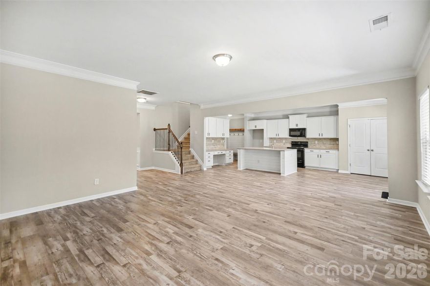 ****NEW PICTURES-Take a look at the new flooring. Beautiful 4 Bedroom, 2.5 Bath Home located in the desirable River Park Subdivision. Home offers a covered front porch and back porch with curtains and ceiling fans. The extended concrete pad is a great place for a grill/entertaining. The backyard offers a stone firepit. A welcoming entryway with formal dining room features an accent wall. The living room also has an accent wall and is open to the kitchen an outside. The spacious kitchen features beautiful countertops, and black appliances.  The island has seating/storage and ship lap.  There are plenty of cabinets for storage and a pantry. There is also a breakfast area! Spacious Primary Suite on upper level with a private bath & walk in closet! Primary Bath features dual vanity, garden tub, separate shower, and water closet. Three additional Bedrooms on upper level, one offers an accent wall! Community amenities include a walking trail, playground, pool and clubhouse. Conveniently located near I485, Charlotte and downtown Mount Holly.
