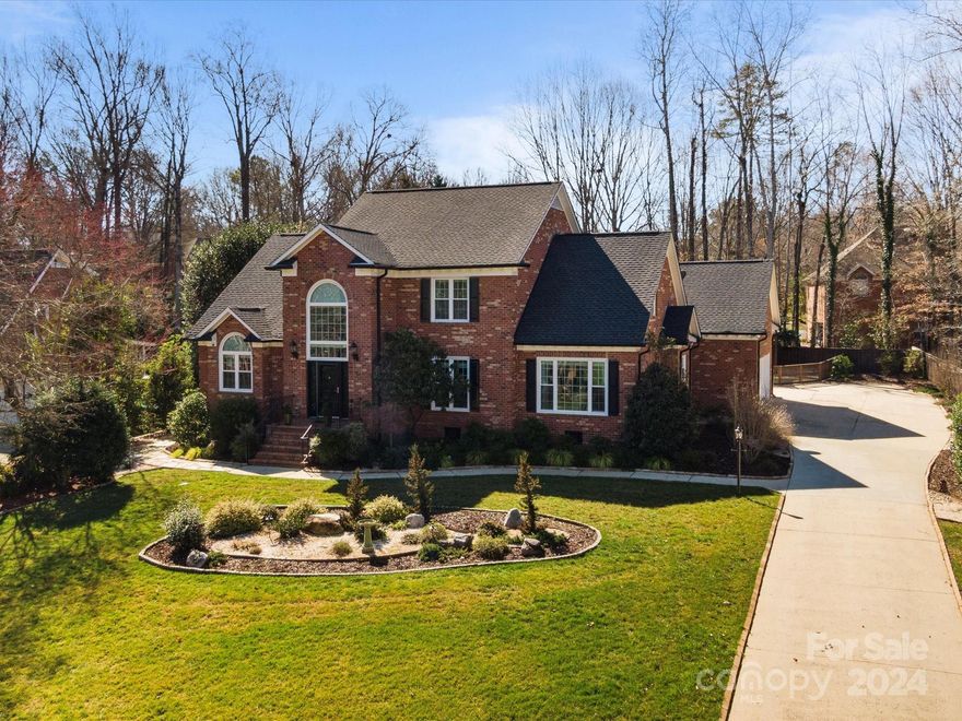 Welcome to your dream home in the prestigious Carriage Downs! This immaculate all brick residence on an almost half acre lot has been remodeled with a host of upgrades, including a new 50+yr roof (2021), Fully encapsulated crawl space (2020), All new windows (2020), new gutter guards / downspouts (2020), New tankless water heater (2020), Refinished hardwood floors (2023), new carpet upstairs & entire interior repainted (2020) & more!.  This spacious floor plan offers the primary suite on the main floor, complete with an oversized walk-in closet, trey ceiling, and lavish primary bath w/ a seamless shower & tub.  The kitchen has granite countertops and S/S appliances that is open to eat in kitchen.  Step outside to the oversized screened porch, perfect for relaxation, all while overlooking the private fully fenced in backyard.  This home has 2 bonus rooms, including a 3rd floor space ideal for a home theater, office, or playroom.  Experience the ultimate in low-maintenance luxury!