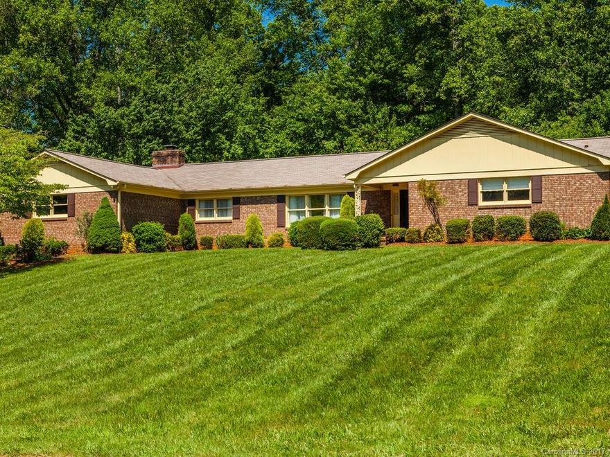 Well-built, large, 4 bedroom, 3 bath home on big lot in a great location in Ballantree.   Two car garage, sunroom and large fenced back yard with fruit trees galore.  Open kitchen/family room with fireplace and natural gas heat. Ballantree is located in a convenient South Asheville location only minutes to downtown Asheville and Hendersonville.  This home will not last long.  Must see.