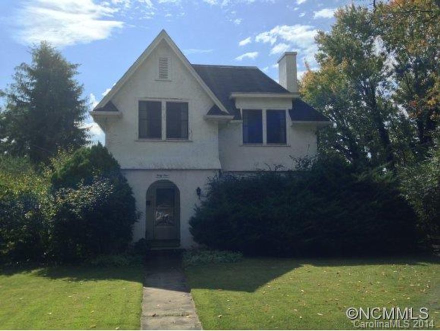 Older North Asheville Charm in established neighborhood.  Home has beautiful wood floors under carpet.  Tremendous potential for updating.  Nice level yard.  Spacious living areas.  Large bedrooms.  Basement could be finished and used as studio apartment.  Convenient location off Merrimon Avenue.