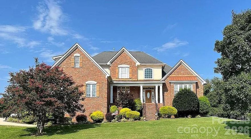This beautiful custom home is located in the desirable Larkin Golf Club community in Statesville, offering spacious living areas on a large lot backing up to the 9th fairway. This all-brick home with stucco dormers features cathedral ceilings in the entryway and living room, custom crown molding, plantation wood blinds, and ¾" tongue-and-groove hardwood floors throughout much of the main level. The living room showcases skylights and a gas fireplace, creating a warm and inviting gathering space.

The kitchen offers granite countertops, ample storage with real wood cabinetry, stainless steel appliances, and a new LG Smart refrigerator, along with a bright sunroom where French doors open to the covered back porch with new Trex decking, ideal for relaxing or entertaining.

The main-level primary suite features French doors to the back porch, a cathedral ceiling, Jacuzzi tub, and a spacious walk-in closet. A second flex room on the main floor works well as a guest room, office, den, or craft space.

Upstairs includes two additional bedrooms, one with golf course views, a large bonus room or potential fifth bedroom, and a sitting area ideal for a game room, office, or reading nook.

Additional highlights include a new roof (2025), on-demand hot water, an oversized garage with a storage system, and mature landscaping, including rose bushes, crape myrtle trees, and Japanese maple trees offering seasonal color. Enjoy access to Larkin Golf Club amenities including golf, pool, tennis, pickleball, and dining.