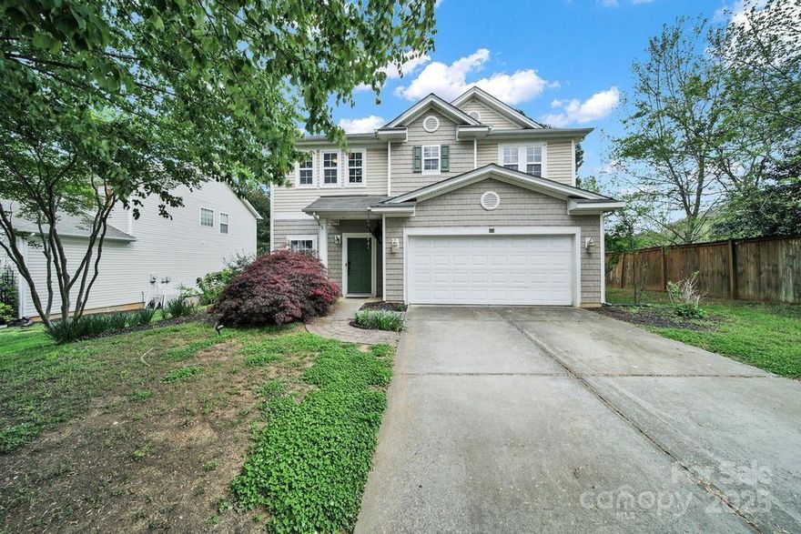 Welcome home to this charming, spacious five bedroom home in sought after Fort Mill school district! Through the front door you are met with an open and airy Living and Dining room space with tons of light! Large Family room is open to kitchen with a gorgeous wooded backdrop off breakfast area. Large kitchen features 42 inch cabinets, lots of counter space and gas cooktop. Convenient bedroom downstairs near garage entrance. The staircase leads you to the upper level featuring new carpeting throughout. Oversized primary suite with en-suite bath and huge walk-in closet are the highlight of the upstairs! Loft, Laundry room and additional large bedrooms and newly remodeled bath round out the second floor. Private, lush backyard with stone paver patio! Wonderful pool and HOA activities round out this amazing home. Come make it your own!