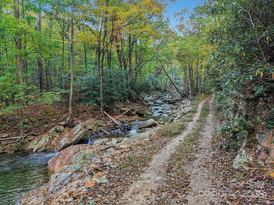 Wonderful opportunity on this private open use parcel. No restrictions on type of structure nor minimum square footage requirements. Perfect for placing a few tiny homes or campers. Rough drive cut in. Property will need well and septic. Subdividing is possible, but would have to meet McDowell County subdivision requirements on roads and drainage if divided. Perfect spot for those seeking serenity and no restrictions