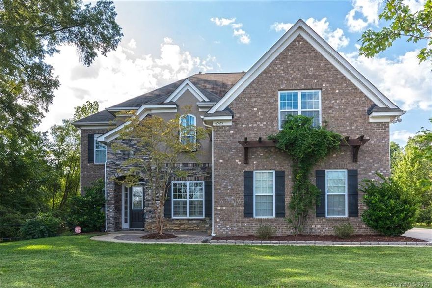 New Price on this Stunning all brick home w/ 3 car side load garage in popular Stone Creek Ranch! Fabulous updated gourmet kitchen w/refinished cabinets, beautiful granite, gas cook top, stainless steel appliances &walk-in pantry.  Flex space on main floor, formal LR, DR and spacious family room w/gas fireplace. Lovely MSTR suite & 3 additional bedrooms, huge 5th bedroom/bonus room with custom built ins.  Plantation shutters and blinds throughout, irrigation, security system, fenced yard!