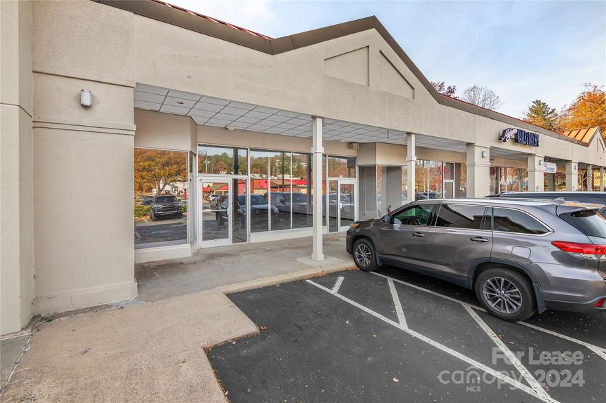 Take advantage of the location of this shopping center near major retailers and Asheville Mall!  Large space, over 5,000 Square Feet, is perfect for a gym, fitness, wellness, or large retail showroom floor.  Expansive parking lot where searching for a space will not be an issue for your customers.  The space is in ready condition and has 2 restrooms.  Easy access off Tunnel Road, a major shopping corridor, and a stone's throw from the Interstate.