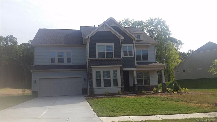 Great 2 story , master up plan with three additional bedrooms, screen porch with paver patio, 2 car with tandem garage