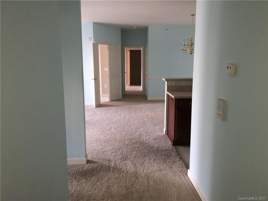 Fabulous, move in ready 3 bed, 2 bath 2nd floor condo only minutes from UNC! Secured building entrance.  Spacious open floor plan, with dark cherry cabinets in kitchen. Private owners suite has huge WIC, and bath has dual sinks, soaking tub, and separate shower. Fridge, Stove, Micro, W/D stay. 1 car garage. Balcony, and additional outdoor locked storage room.

Community clubhouse, fitness center, pool, picnic area w/ bbq.