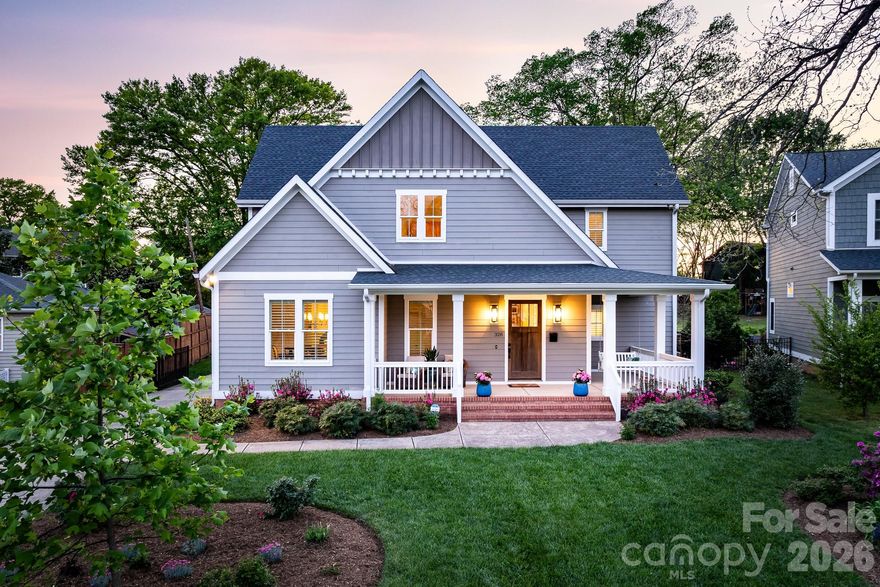 Delivering timeless style, privacy and an unbeatable location, this Sedgefield gem is filled with both beautiful and practical features throughout, on one of the larger lots in the neighborhood. This stunning home invites you to truly settle in and stay a while. From the moment you arrive, the wraparound front porch sets the tone as a place for morning coffee, evening conversation and everything in between with a skyline view. Inside, the home feels effortlessly elegant yet completely livable, with sun filled spaces and thoughtful details at every turn. The well appointed kitchen is designed for both everyday living and entertaining and features a huge center island, stainless steel appliances, classic backsplash, plenty of cabinetry, designer lighting and walk in pantry. It opens seamlessly to the great room which showcases beautiful coffered ceilings and custom built-in cabinetry adding additional charm and elegance. A guest suite with full bath is also conveniently located on the first floor.

A spacious laundry room offers abundant workspace and cabinetry, while the dual drop zones with built in cubbies offer the perfect spot for coats and shoes. 

At the end of the day retreat to the serene primary suite, a private escape with an oversized, walk-in double shower and dual closets. Every bedroom offers its own en suite bath and generous closets giving everyone their space and privacy. Additional highlights include plantation shutters throughout, 10-foot ceilings on the main level and wide hallways that enhance the home's open, airy feel.
Step outside and enjoy a backyard made for easy living-whether it's quiet mornings on the covered porch or gathering with friends on a warm evening. Beyond your front door, the best of Charlotte is just a short stroll away-coffee shops, breweries, the Rail Trail and groceries.
Situated on a large, flat lot, the property also features a two car detached garage and a convenient, automatic driveway gate.